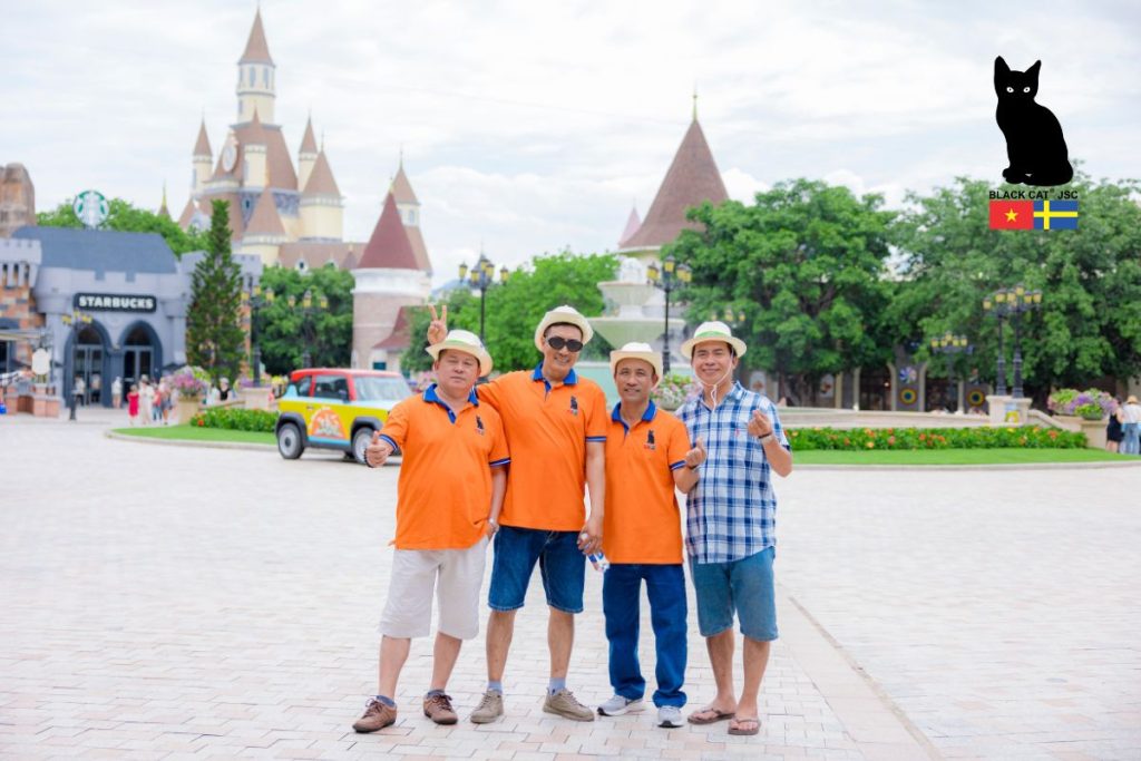 Black Cat JSC employees posing for a commemorative photo at the VinWonders Nha Trang complex
