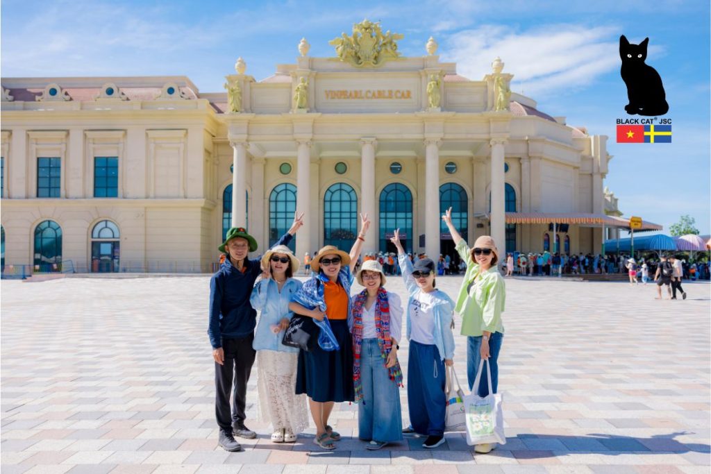 Black Cat JSC employees posing for a commemorative photo at the VinWonders Nha Trang complex
