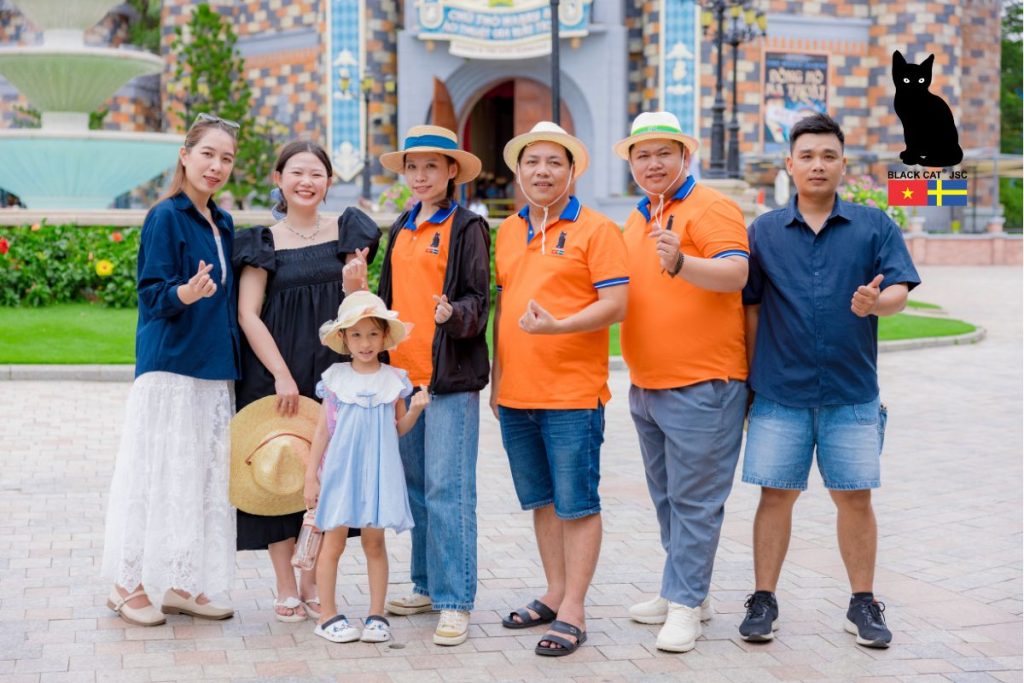 Black Cat JSC employees posing for a commemorative photo at the VinWonders Nha Trang complex